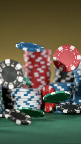 Super slow motion of falling poker chips. Filmed on high speed cinema camera, 1000fps. Speed ramp effect.