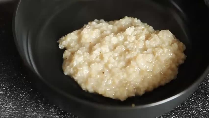 Oatmeal porridge with strawberries and nuts healthy breakfast appetizer dish fresh gourmet food background on the table rustic food top view copy space keto and paleo diet vegetarian and vegan food