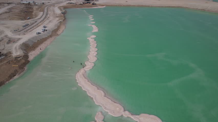 Aerial video over the beautiful desert landscapes of the Dead Sea Israel
