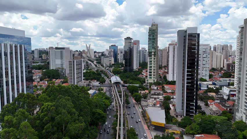 Aerial video of the urban buildings city of Sao Paulo Brazil during sunny day