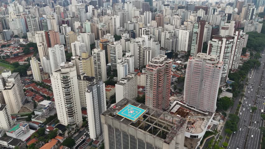 Aerial video of the urban buildings city of Sao Paulo Brazil during sunny day