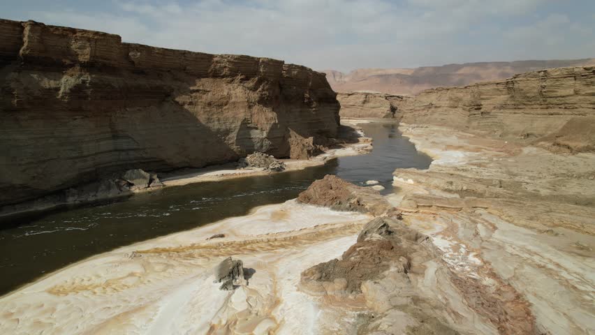 Aerial video over the beautiful desert landscapes of the Dead Sea Israel