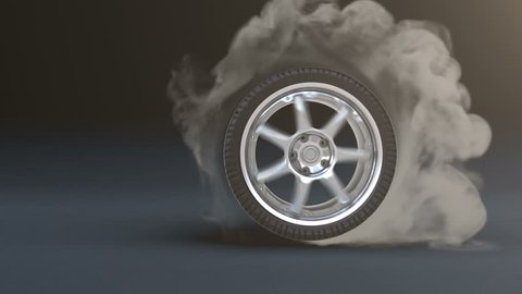 Tire Burnout. Smoke on dark background.