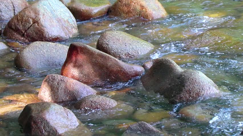 Beautiful tropical forest jungle natural landscape nature coast sea and beach with clear blue turquoise water wave and boulders rocks in Khao Lak Lak Lam Ru National Park Khuekkhak Phang Nga Thailand.