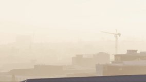 Upward arrow with success text overlaying animation of hazy cityscape and cranes. Growth, progress, achievement, urban, construction, development - Powered by Shutterstock - Get 15% off with code: PIKWIZARD15