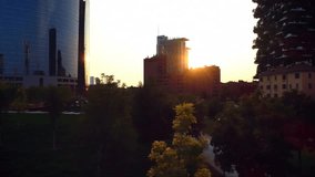 Animation of abstract contour lines overlaying urban skyline during sunset. Cityscape, metropolis, silhouette, gradient, design, graphic - Powered by Shutterstock - Get 15% off with code: PIKWIZARD15