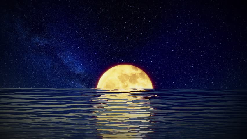 The moon rises over the water at night on Mid-Autumn Festival