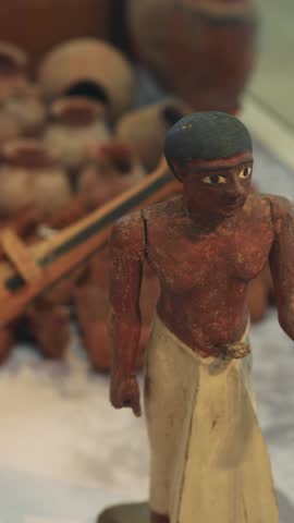 Miniature boat with figures and pottery