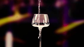 A martini is poured and garnished with olives against a vibrant, blurred background, highlighting the cocktail's elegance - Powered by Shutterstock - Get 15% off with code: PIKWIZARD15