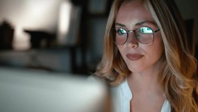 Video of close up of concentrated young business woman working with computer in the office at night - Powered by Shutterstock - Get 15% off with code: PIKWIZARD15