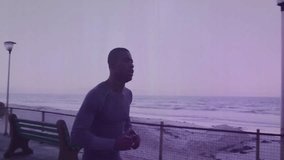 Jogging on boardwalk, man viewing financial data charts in animation overlay. Exercise, technology, fitness, analysis, finance, digital - Powered by Shutterstock - Get 15% off with code: PIKWIZARD15