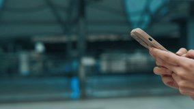 Woman writes messages in online chat on smartphone closeup. Female corporate employee texts on mobile phone walking alone street. Digital communication technology for business - Powered by Shutterstock - Get 15% off with code: PIKWIZARD15