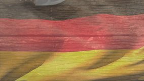 Raw meat slices in packaging with German flag colors on wooden table. Food, fresh, protein, meal, cooking, preparation - Powered by Shutterstock - Get 15% off with code: PIKWIZARD15