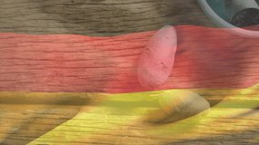 Sliced sausages in German flag colors on wooden surface, creating animation effect. culinary, food, cuisine, cooking, slicing, preparation - Powered by Shutterstock - Get 15% off with code: PIKWIZARD15