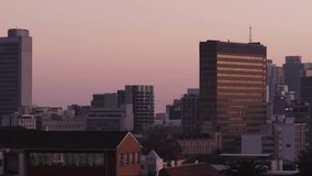 Animation of geometric pattern overlaying urban skyline with textured background. Abstract, digital, futuristic, modern, graphic design, cityscape - Powered by Shutterstock - Get 15% off with code: PIKWIZARD15