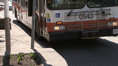 Passengers Boarding City Bus