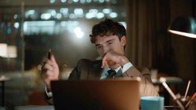 Late worker closing laptop tired of overtime work in night office closeup. Depressed businessman finish project at dark workplace worried deadline. Upset entrepreneur feeling overworked late evening - Powered by Shutterstock - Get 15% off with code: PIKWIZARD15