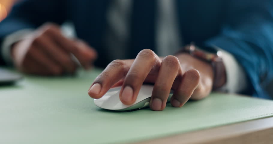 Businessman, moving and hand on mouse in office for survey, computer update or information review. Closeup, selection and banker with technology on pad for cursor, feedback and online report at desk