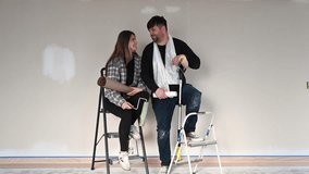 A couple in love kisses and forms a heart with their fingers, their silhouettes are reflected on the wall. - Powered by Shutterstock - Get 15% off with code: PIKWIZARD15