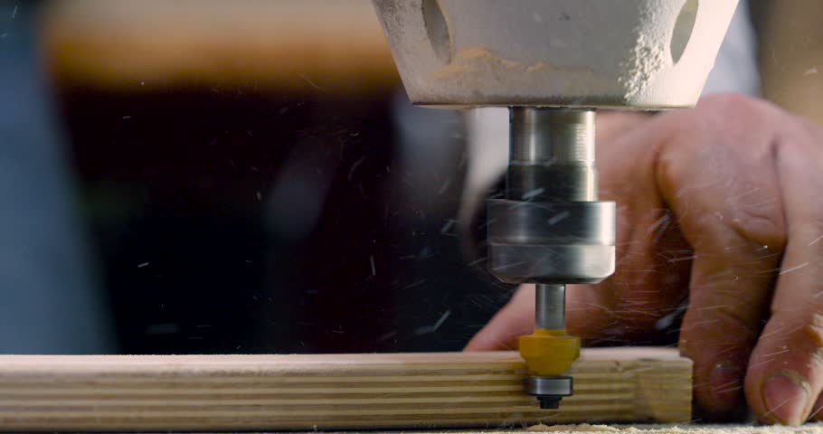Furniture manufacturing. Detail processing close-up. The master
