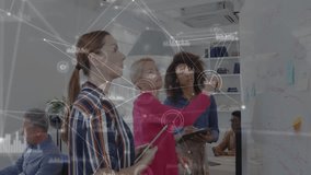 Diverse team collaborating on whiteboard with data processing animation overlay. Teamwork, brainstorming, innovation, creativity, technology, collaboration - Powered by Shutterstock - Get 15% off with code: PIKWIZARD15