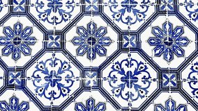 Traditional white and blue glazed tile azulejos on the facade of the house in Lisbon, Portugal. Abstract background, 
 - Powered by Shutterstock - Get 15% off with code: PIKWIZARD15