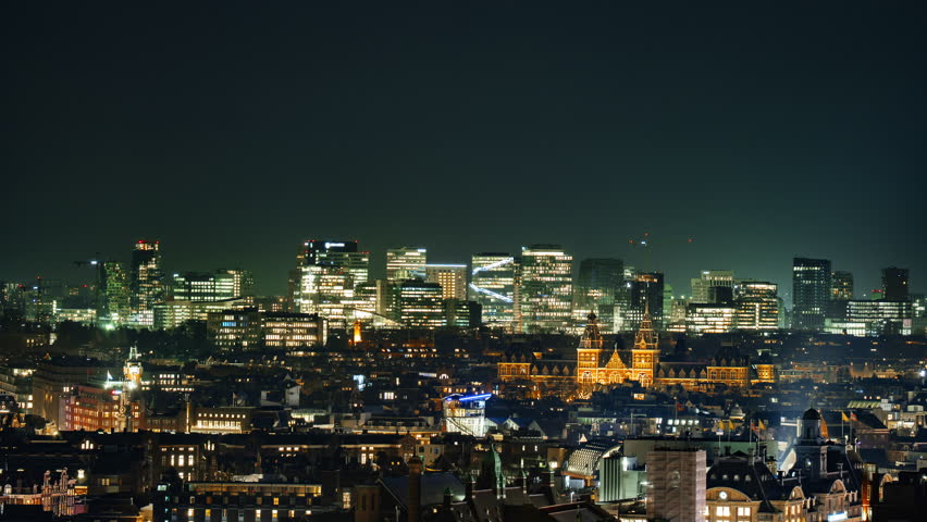 The illuminated skyline of Amsterdam