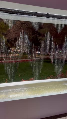 waterfall in the park in the evening