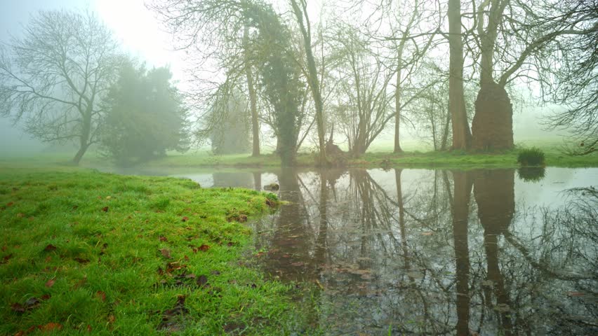 Misty Countryside Reflections in Morning Light
