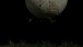 Stock market graphs and data processing animation over old soccer ball on grass. Finance, economy, technology, analytics, investment, business - Powered by Shutterstock - Get 15% off with code: PIKWIZARD15
