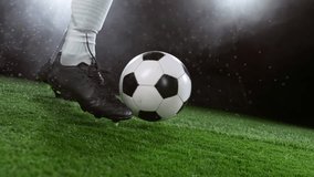 Close-up of Football Player Kicking Soccer Ball, Rainy Weather, Fog in Background. Super Slow Motion at 1000 fps. Filmed on High Speed Cinematic Camera at 1000 fps. - Powered by Shutterstock - Get 15% off with code: PIKWIZARD15