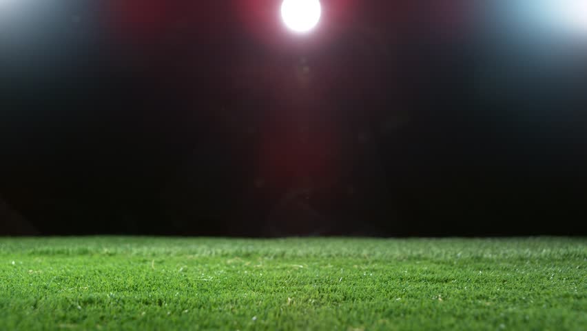 Close-up of Soccer Ball, Rainy Weather, Fog in Background. Super Slow Motion at 1000 fps