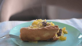 Steaming hot shepherd's pie with a golden crust, served on a light teal plate, ready to be enjoyed. Traditional tatar pie with meat and potatoes - Powered by Shutterstock - Get 15% off with code: PIKWIZARD15