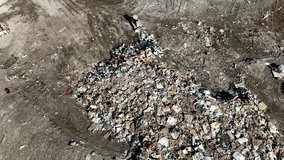 4k drone view showing a bulldozer spreading non-recycable trash at a landfill - Powered by Shutterstock - Get 15% off with code: PIKWIZARD15