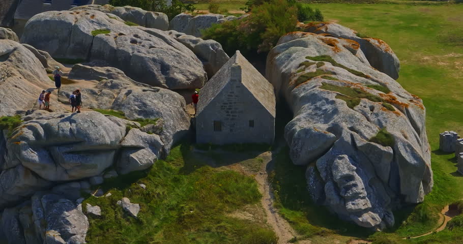France, Meneham, 26 February 2025: Aerial view of an ancient stone house in the rocks