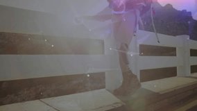 Man with prosthetic leg hiking over bridge, digital connections animation overlay. Technology, innovation, nature, augmented, prosthesis, adventure - Powered by Shutterstock - Get 15% off with code: PIKWIZARD15