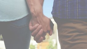 Holding hands, two people with Autism Awareness Month animation and puzzle heart. diversity, connection, support, community - Powered by Shutterstock - Get 15% off with code: PIKWIZARD15