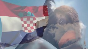 Smiling couple on beach with Croatian flag animation and bright sun overhead. Vacation, travel, summer, tourism, coastline, relaxation - Powered by Shutterstock - Get 15% off with code: PIKWIZARD15