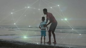 Holding child, father on beach with animation of glowing network connections. Parenthood, bonding, technology, innovation, futuristic, sea - Powered by Shutterstock - Get 15% off with code: PIKWIZARD15