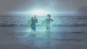 Surfers walking through ocean waves with digital network animation overlay. Surfing, beach, technology, connectivity, adventure, water sports - Powered by Shutterstock - Get 15% off with code: PIKWIZARD15