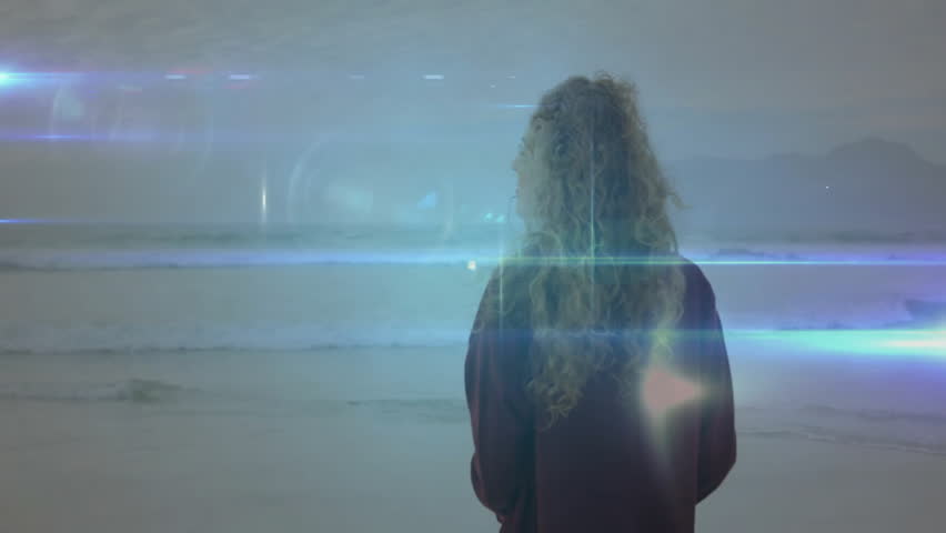Facing ocean, woman with curly hair viewing digital network animation overlay. Technology, innovation, connectivity, communication, female - Powered by Shutterstock - Get 15% off with code: PIKWIZARD15