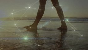 Bare feet walking on beach with glowing network connections animation overlay. Technology, innovation, futuristic, connectivity, travel, digital - Powered by Shutterstock - Get 15% off with code: PIKWIZARD15