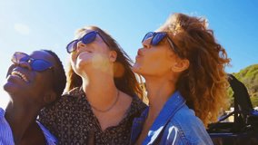 People enjoying outdoors with colorful Huge Sale text animation overlay. Discount, promotion, retail, shopping, marketing, advertisement - Powered by Shutterstock - Get 15% off with code: PIKWIZARD15