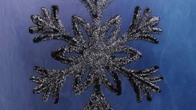 Snowflake background. Glitter mist. Sparkling silver Christmas ornament on blue pink color ink water wave abstract texture. - Powered by Shutterstock - Get 15% off with code: PIKWIZARD15