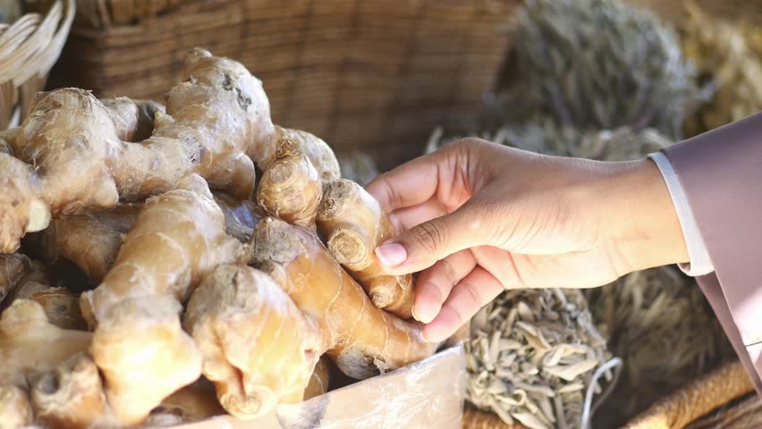 Exploring fresh ginger at a local market in the morning