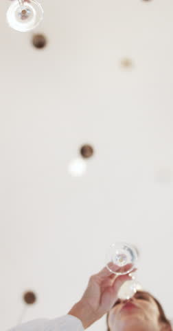 Business people, alcohol or hands with toast for success, startup celebration or social event. Low angle, employees or team with cheers for work goals, champagne glasses or party with drink in office