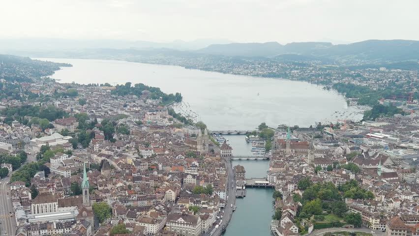 Dolly zoom. Zurich, Switzerland. Panorama of the city overlooking Lake Zurich. Summer day, Aerial View