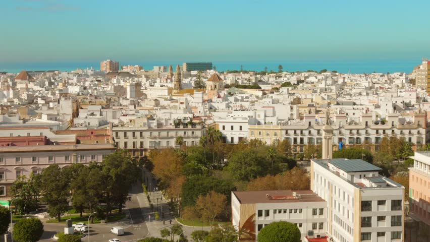 High-angle view of Cadiz, Andalusia, Spain. Features cityscape, architecture, and distant sea. Ideal for travel, architectural, or urban visuals.