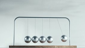 Metallic Newton's Cradle Pendulum with Silver Spheres on Wooden Base - Seamless 4K 3D Animation Loop. 3D Illustration - Powered by Shutterstock - Get 15% off with code: PIKWIZARD15