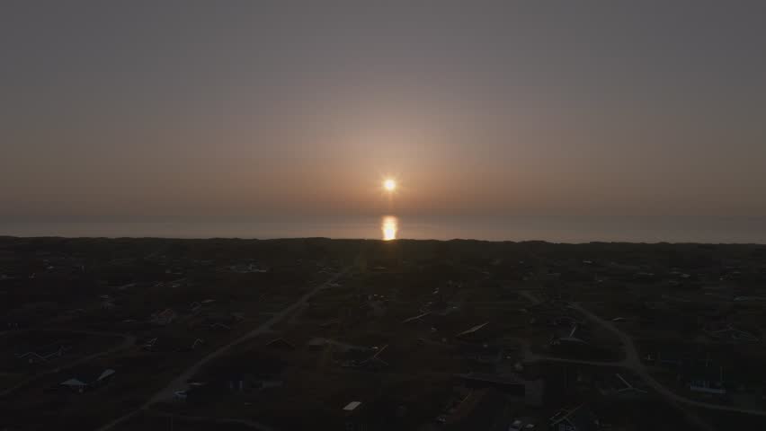Aerial view of a sunset at a beach in Denmark